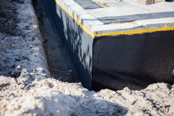 Professional Waterproofing technician working in Hales Corners, WI
